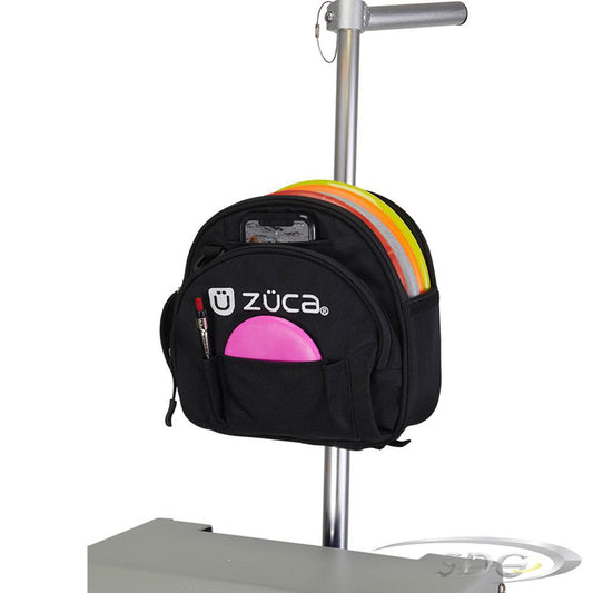Zuca Sling Putter Pouch Attached to Zuca Cart Handle. Pouch shown filled with discs, mini, and pen 