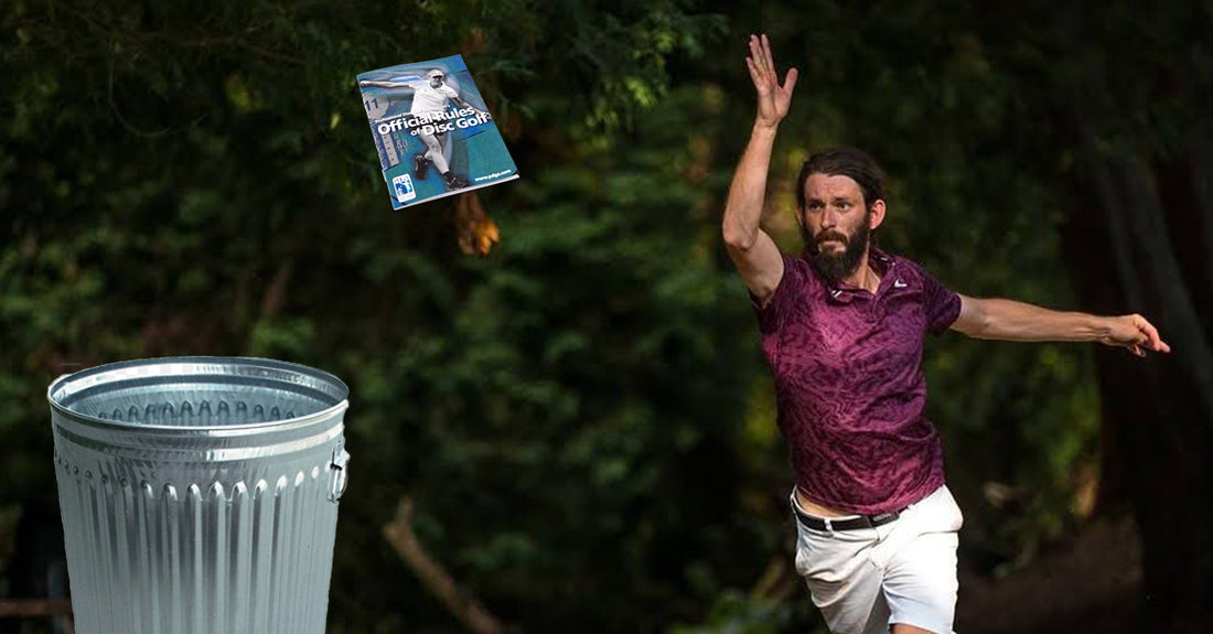 Professional disc golfer James Conrad putts a PDGA rule book into a steel trash can.