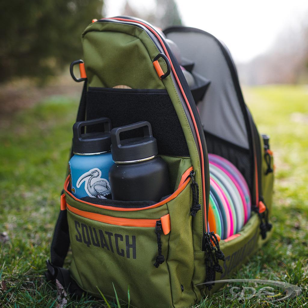 Squatch The Link Bag w/ Cooler Disc Golf Bag forest-orange side view with 2 canteens in side pocket