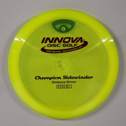 Disc Wall Hanger Disc Golf Accessories with black wall hanger behind yellow disc