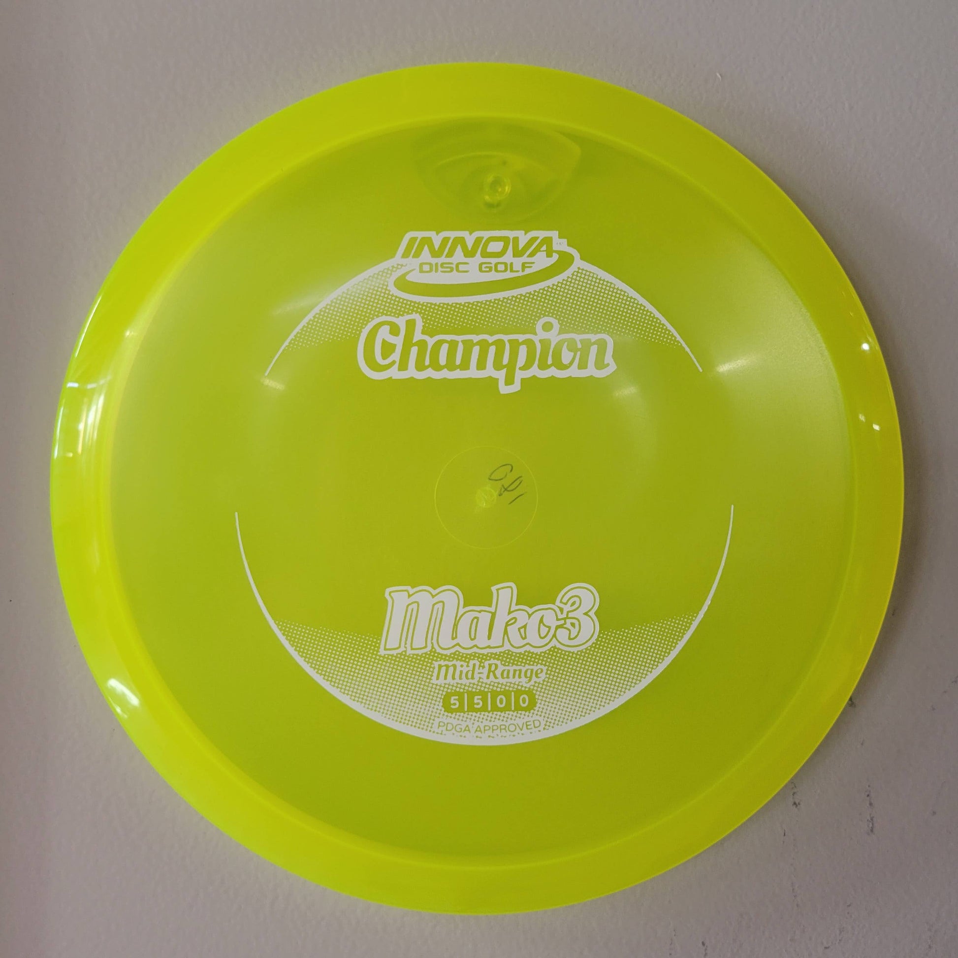 Disc Wall Hanger Disc Golf Accessories will Clear Hanger behind yellow disc