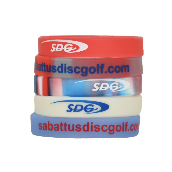 Sabattus Disc Golf Silicon Wrist Bands stacked together in various coloors 