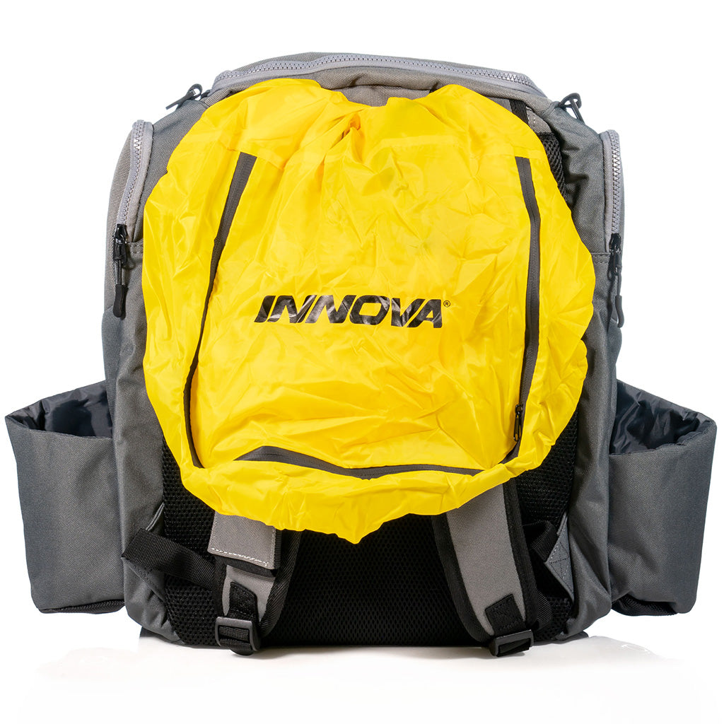 Innova Safari Pack Backpack Disc Golf Bag grey back view shoing yellow rain fly that is included