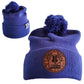 True Royal Knit Pom Pom Beaning with SDG Sabattus Disc Golf Laser Engraved on leather patch that is sewn to the front of the hat, also a back view of the hat with the Rogue Life Maine logo on a small white tag sewn to the hat rim 